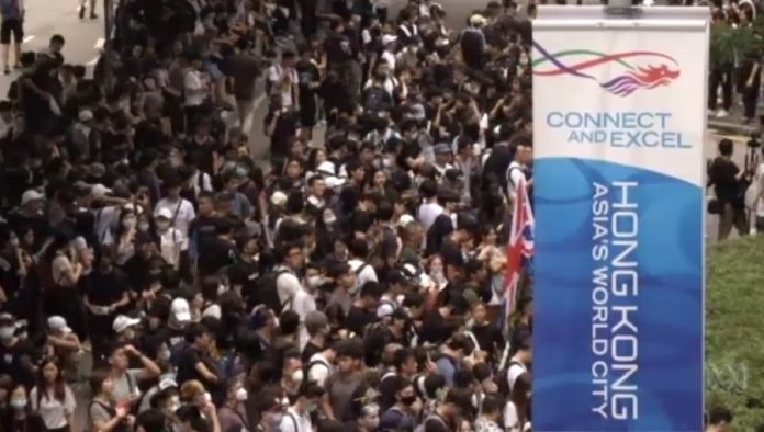 Hong Kong protests continue as extradition law debate is delayed