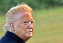 Trump cries foul over a photo showcasing his drastic tan line