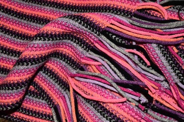 A handmade scarf textile for sale in an online shop.